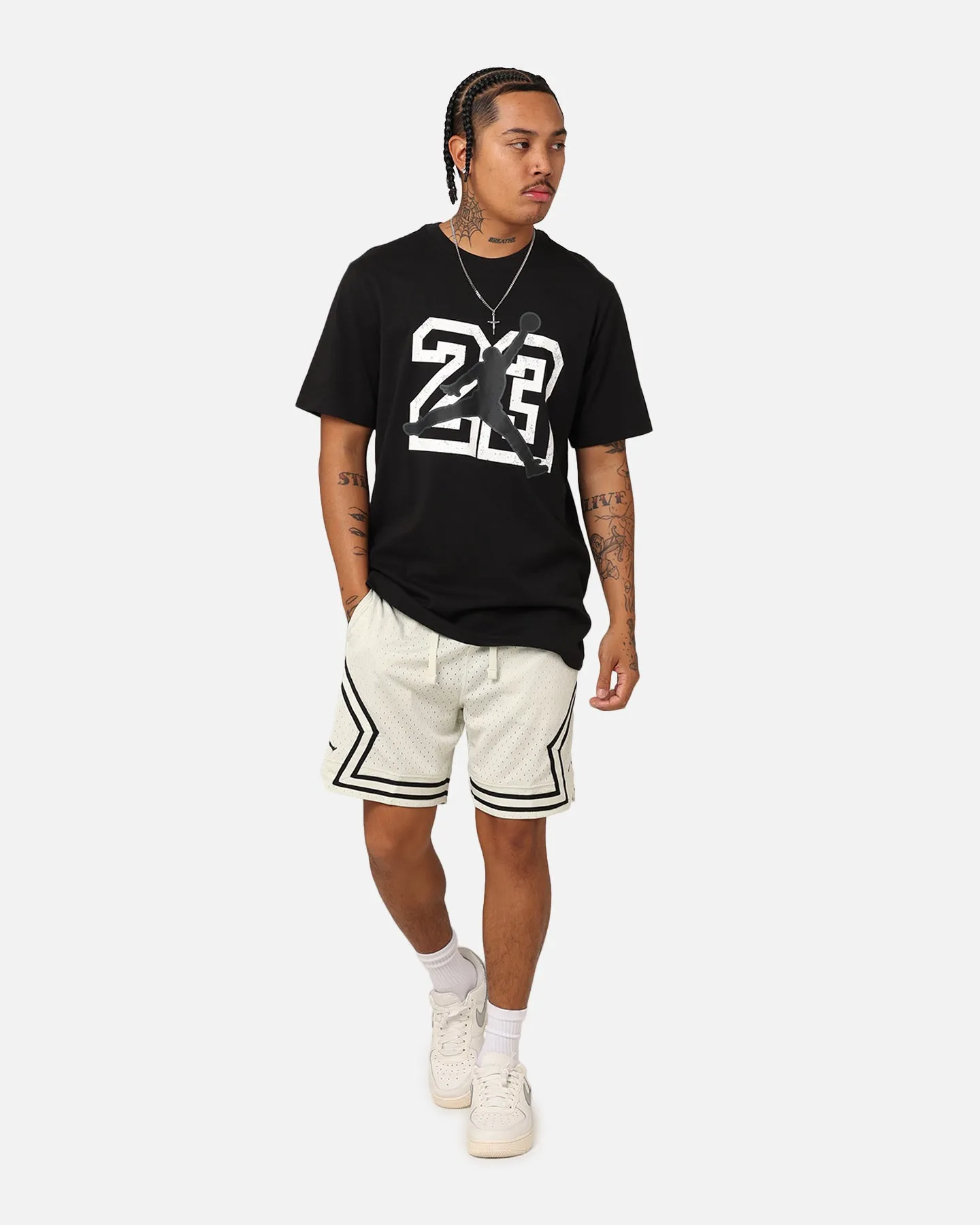 mix and match cycling outfit Jordan Flight Essentials T-Shirt Black/White