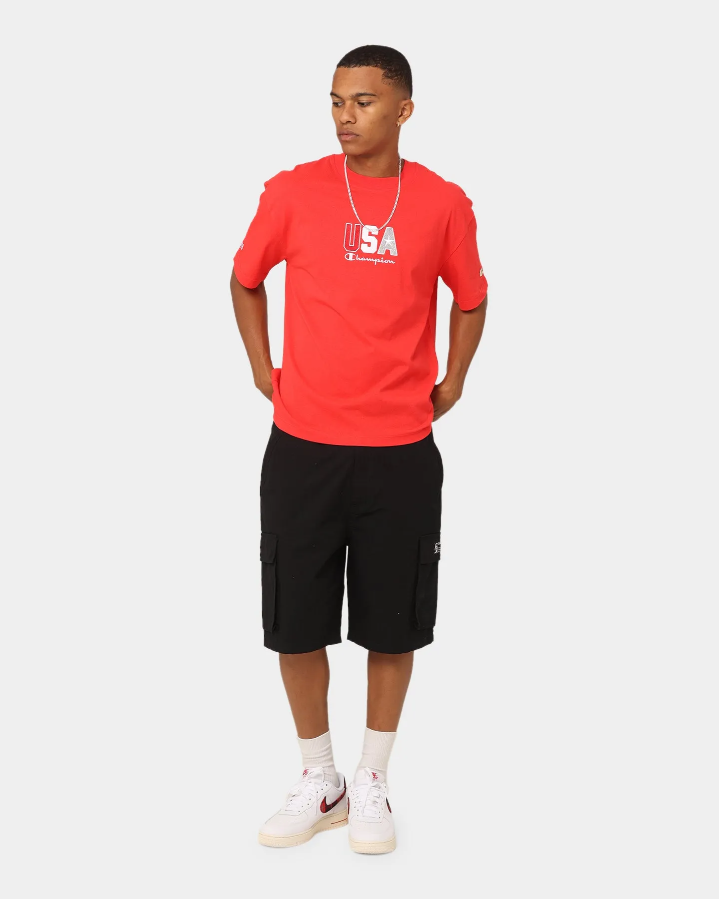 Champion Heritage USA Small Logo T-Shirt Red Spark Csi Stretchable Collar Band Travel Fashion