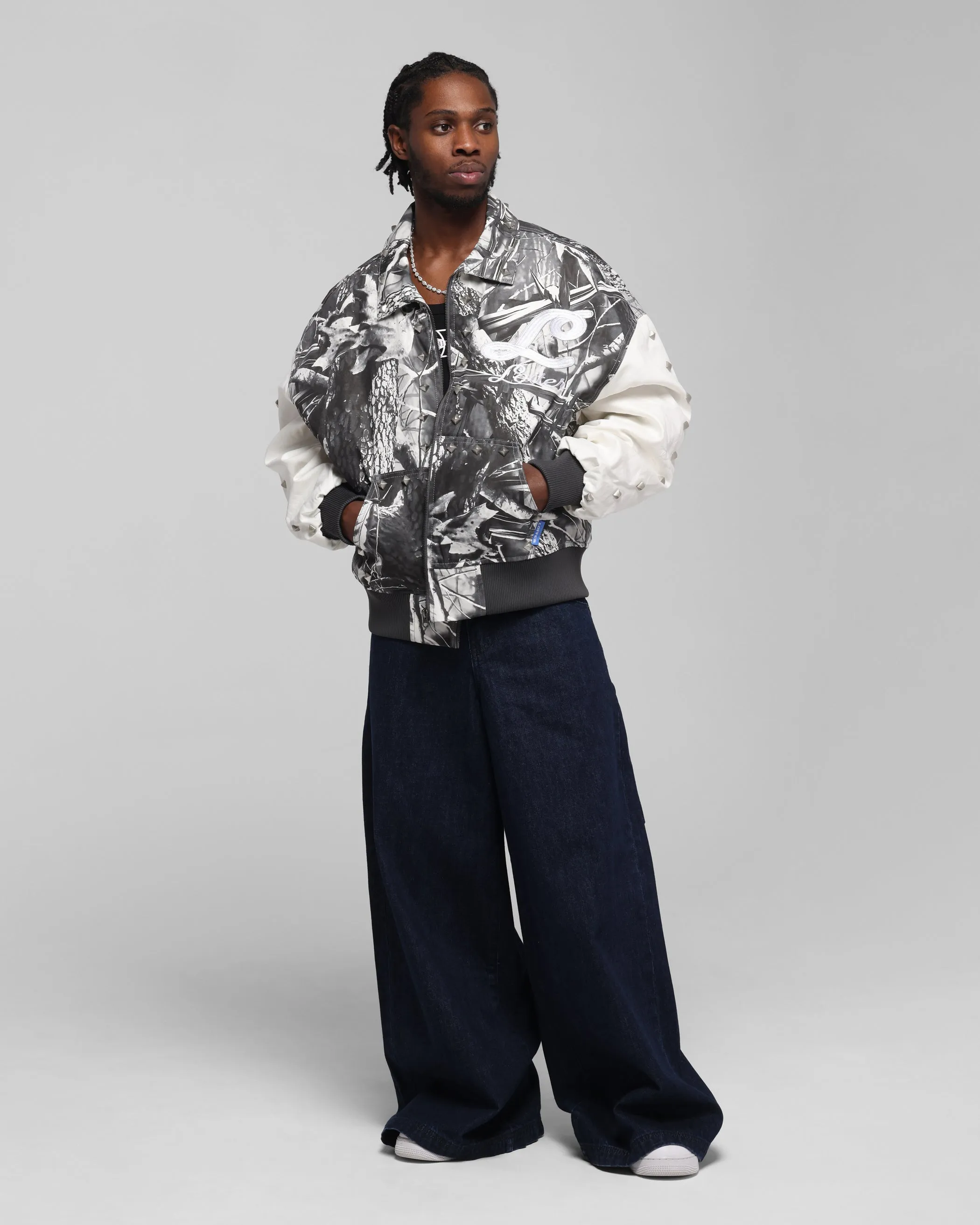 Reinforced Shoulders Enable Loiter Frontier Varsity Jacket Real Tree Camo