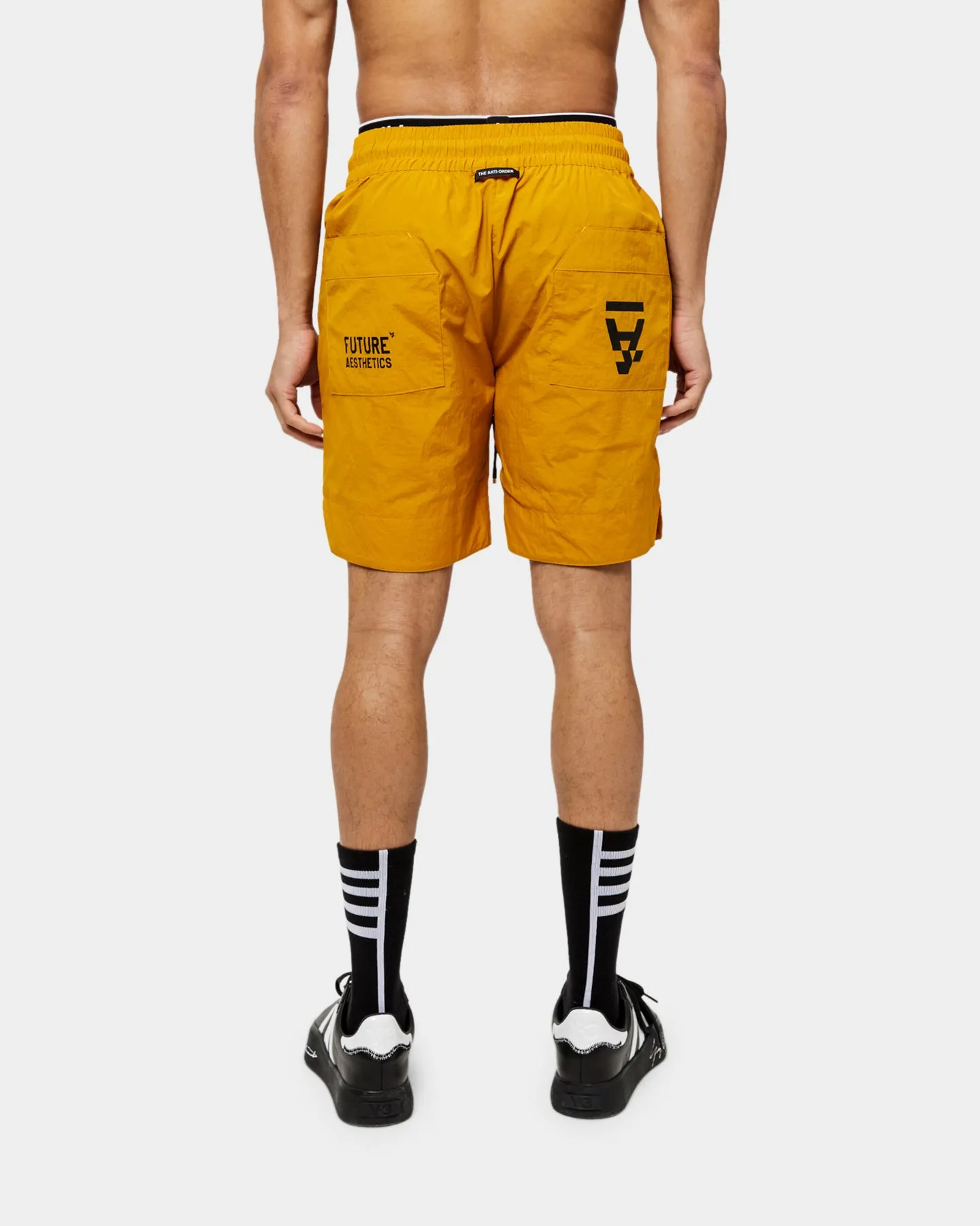 concert outfit The Anti Order Future Walk Shorts Mustard