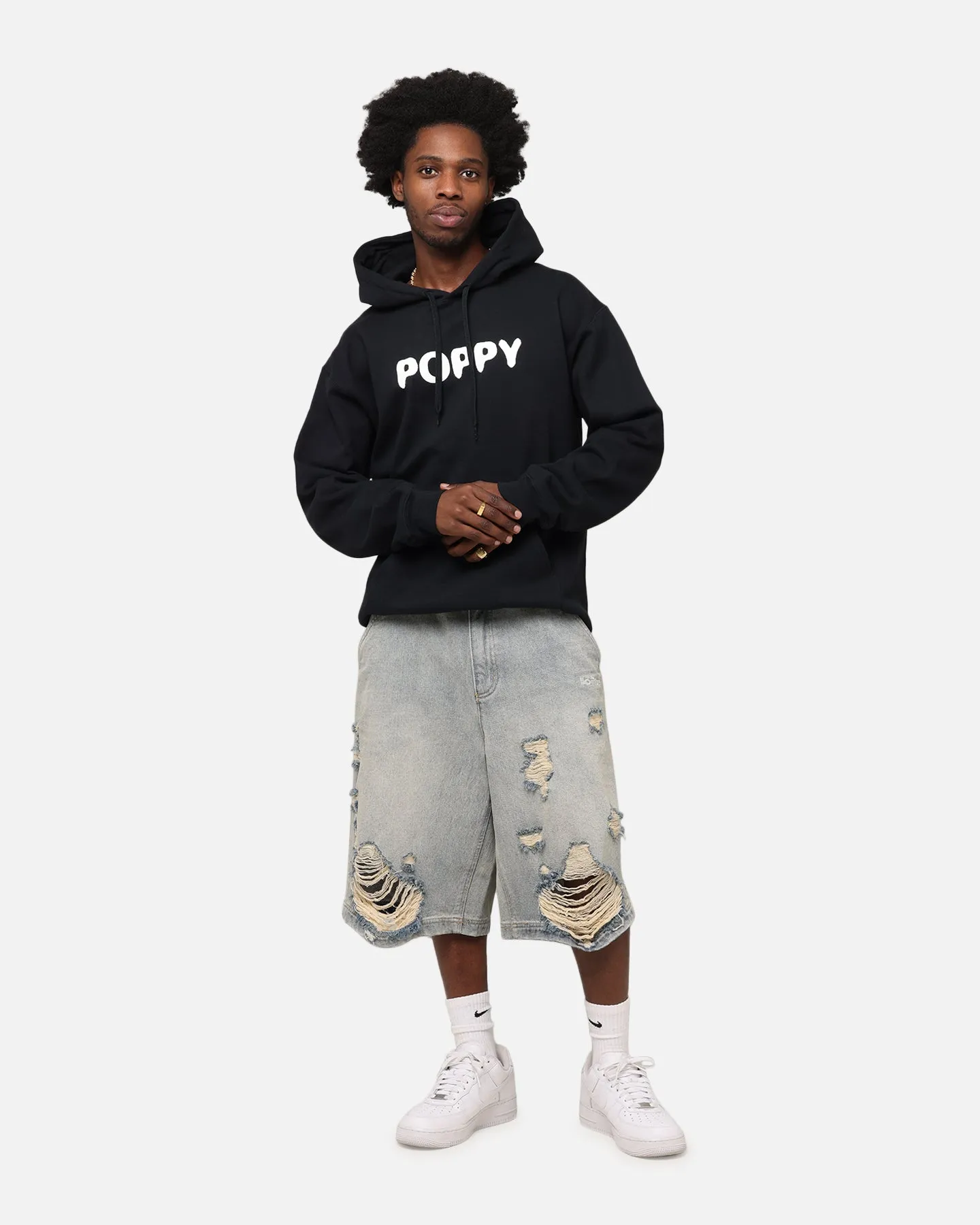 Poppy Negative Spaces Hoodie Black Artistic Detail Lifestyle Energy